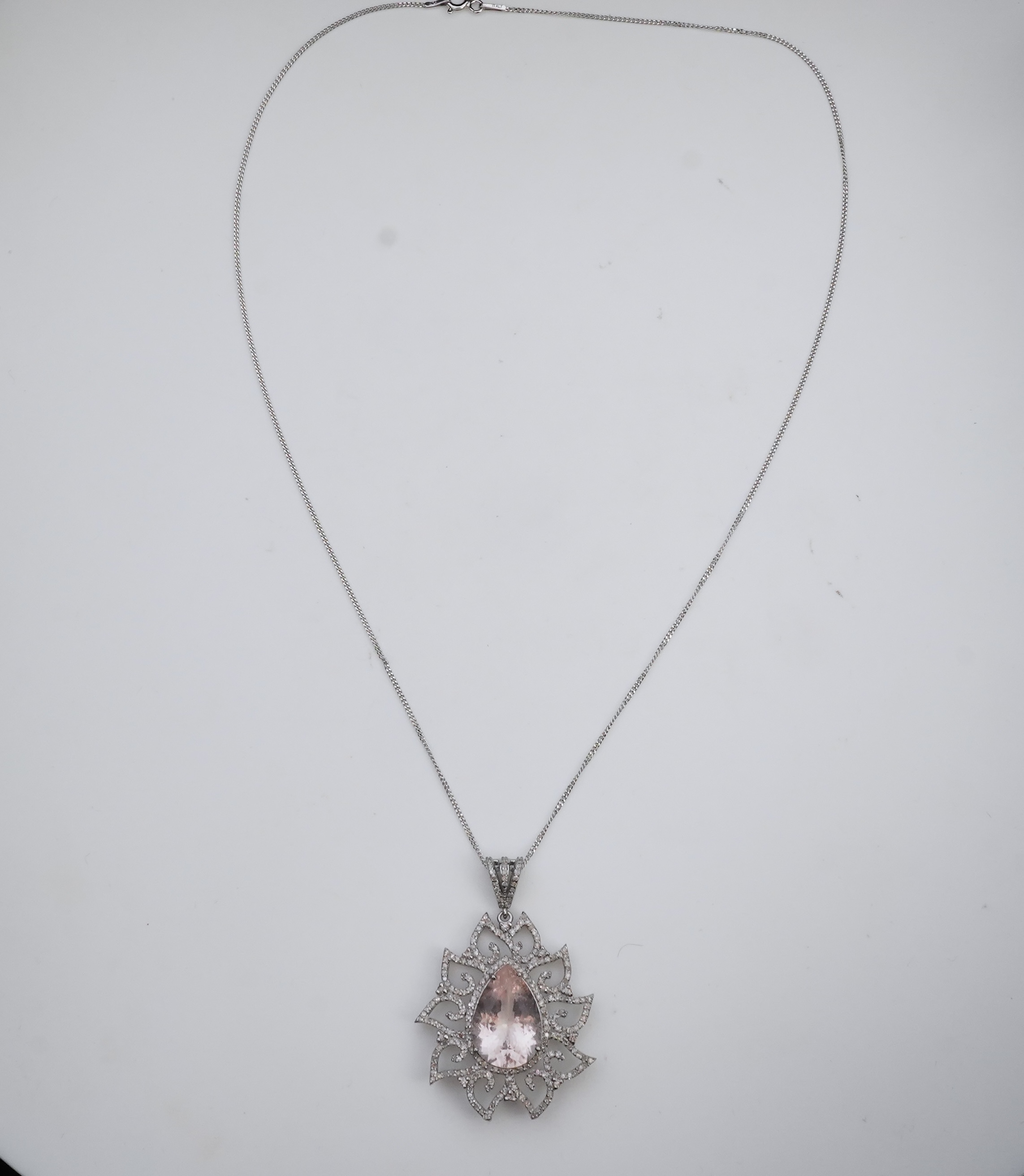 A morganite and diamond pendant